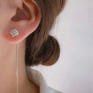 Gold thread earrings with rhinestones